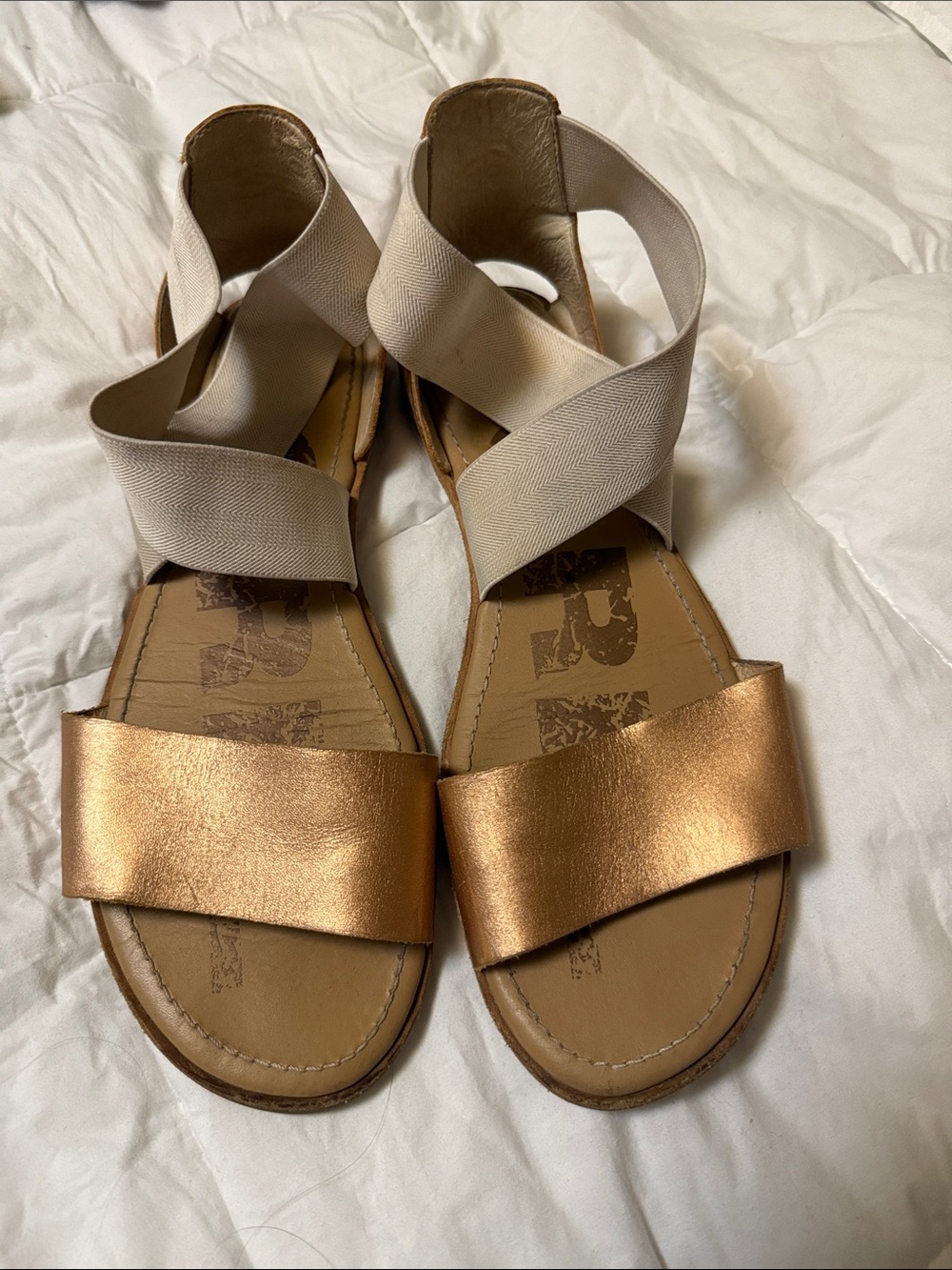 Sorel Metallic Rose Gold Strap Sandals with Cream Elastic Cross Straps